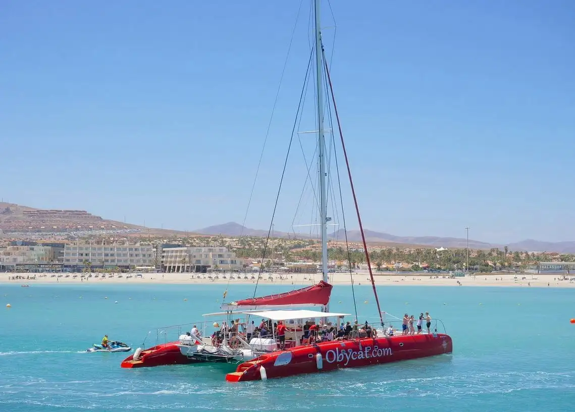 Catamaran anchored off the beach of Caleta de Fuste, Fuerteventura