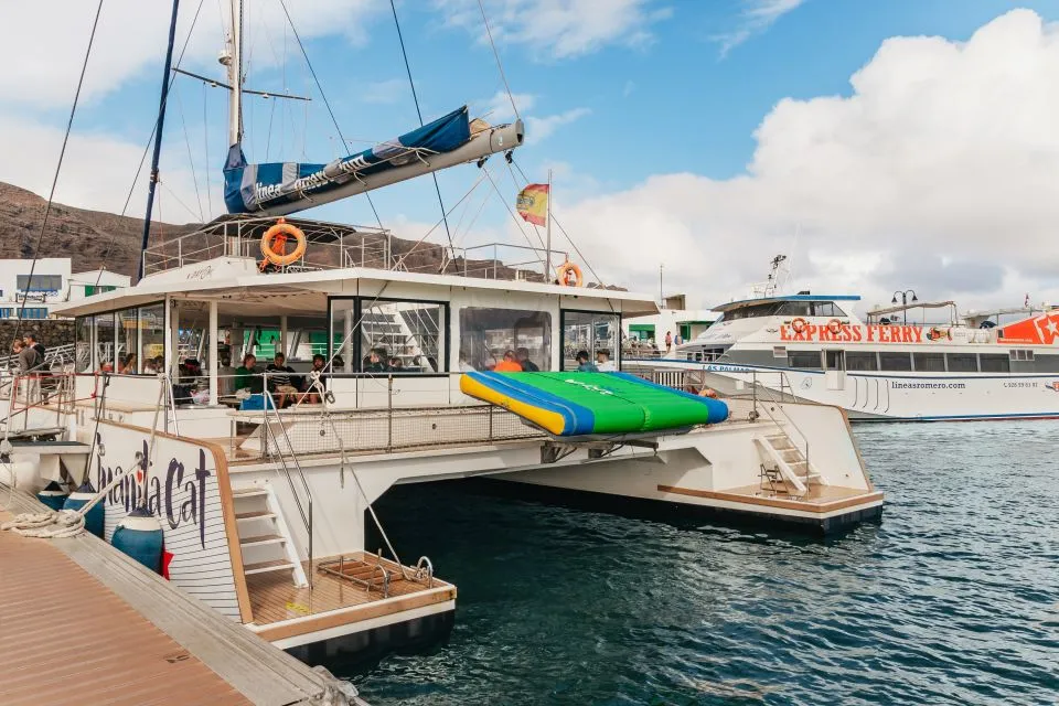 Ferry and catamaran docked at Órzola harbour, the departure point for La Graciosa